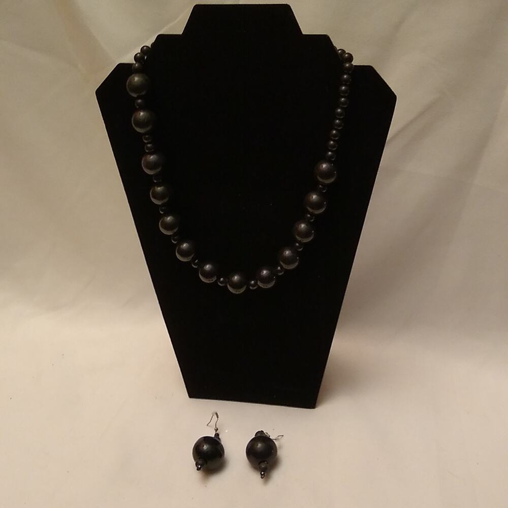 Vintage black beaded necklace plus matching earrings.
